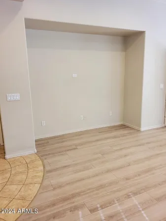 a bathroom with a granite countertop sink a toilet and bathtub