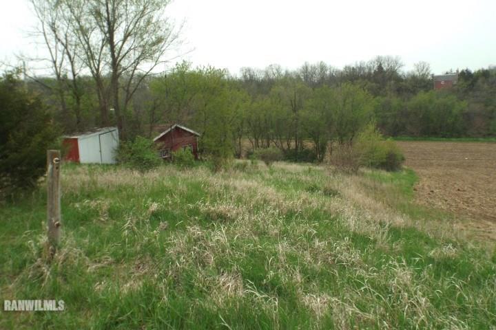 4571 East Welch Road Stockton, IL 61085 - Photo 2 of 8 a backyard of a house with lots of green space