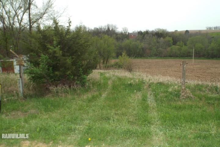 4571 East Welch Road Stockton, IL 61085 - Photo 3 of 8 a view of a lush green field