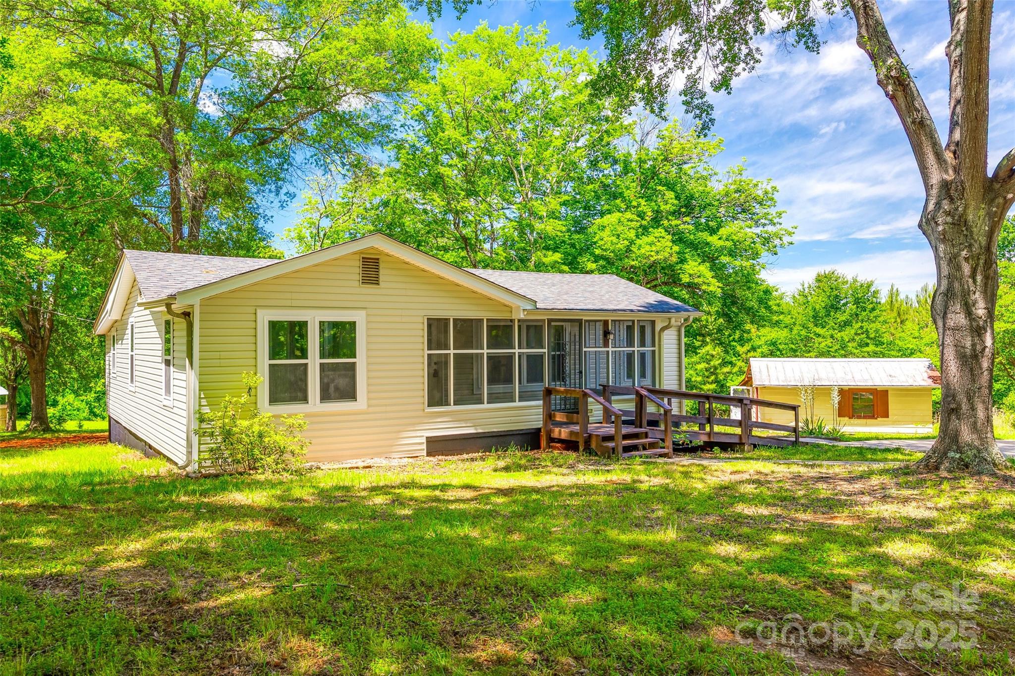 1224 Martin Road Hickory Grove, SC 29717 - Photo 1 of 40 a front view of house with yard and seating area