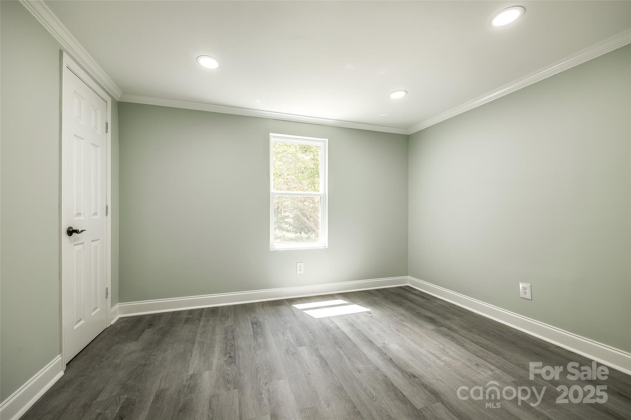1224 Martin Road Hickory Grove, SC 29717 - Photo 14 of 40 wooden floor in an empty room with a window