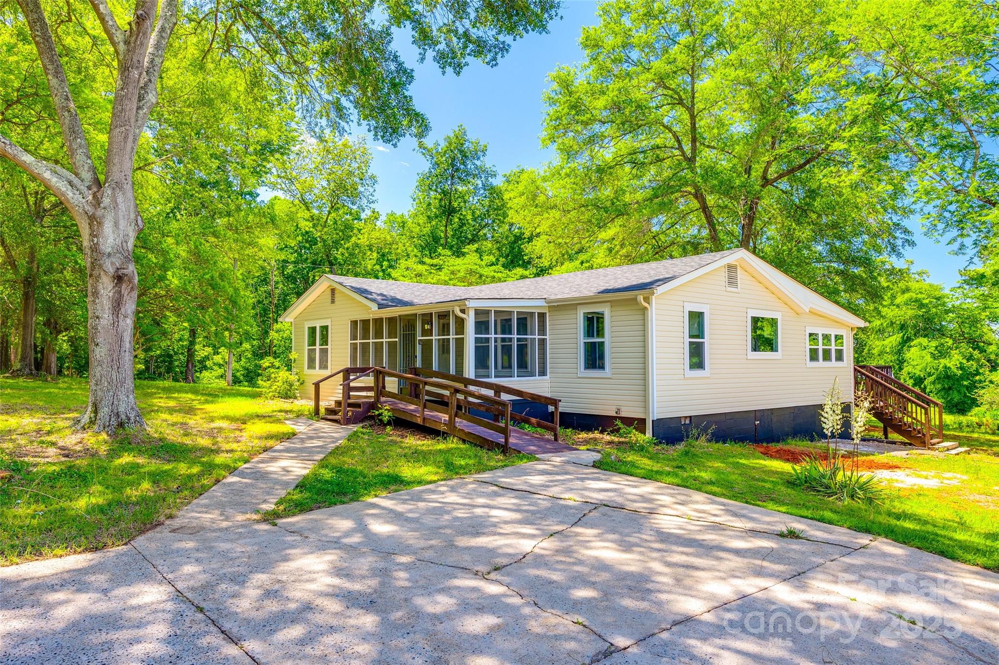 1224 Martin Road Hickory Grove, SC 29717 - Photo 3 of 40 a view of a house with a yard and swimming pool