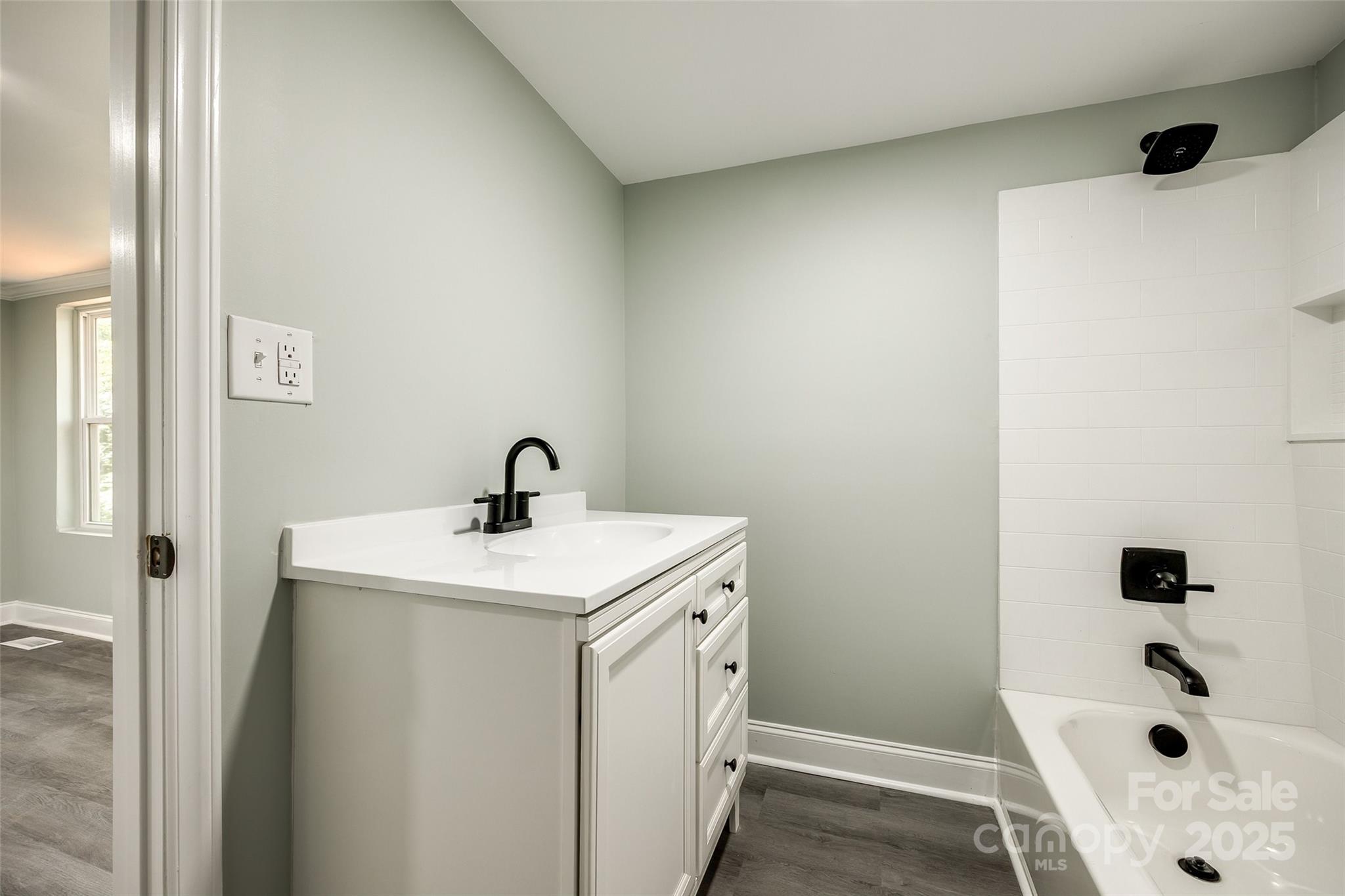 1224 Martin Road Hickory Grove, SC 29717 - Photo 31 of 40 a bathroom with a sink a toilet and shower