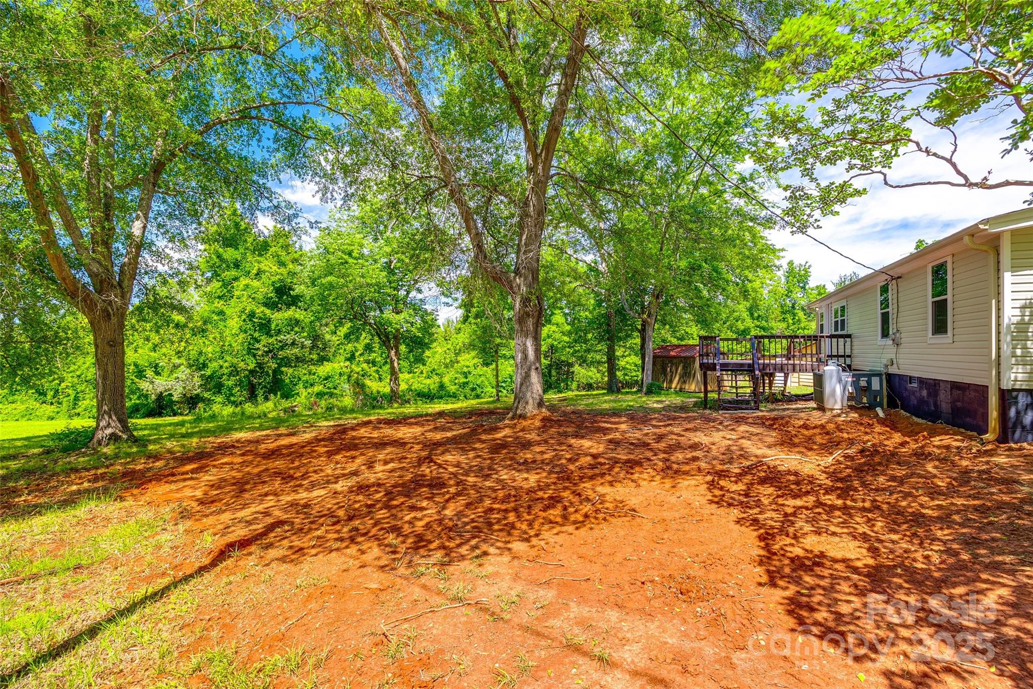 1224 Martin Road Hickory Grove, SC 29717 - Photo 35 of 40 a view of a backyard with large trees