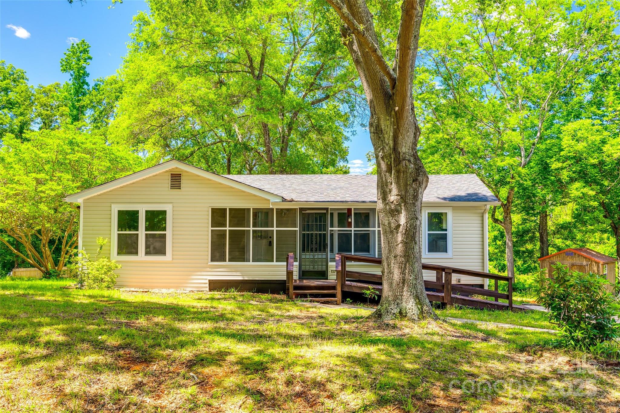 1224 Martin Road Hickory Grove, SC 29717 - Photo 4 of 40 a house with trees in the background