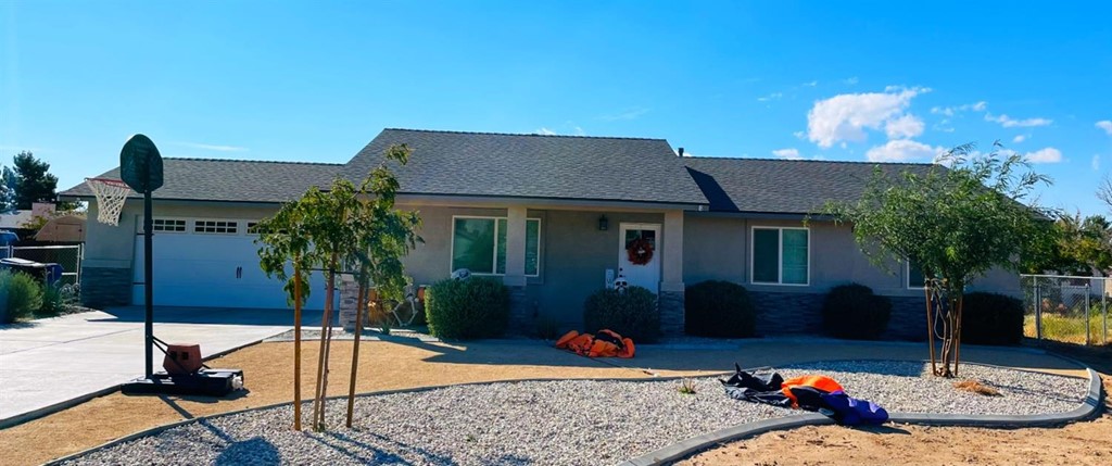 15182 Temecula Road Apple Valley, CA 92307 - Photo 1 of 1 a view of a backyard with furniture