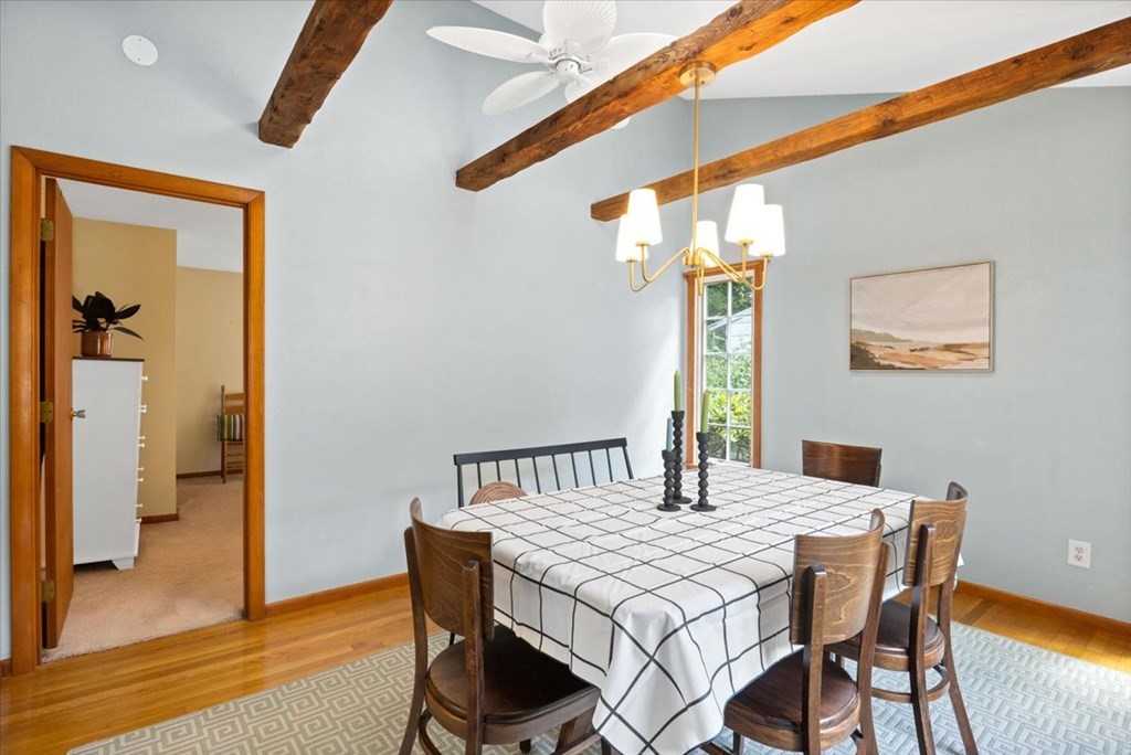 83 Brookside Road Rockland, MA 02370 - Photo 13 of 31 a view of a dining room with furniture and wooden floor