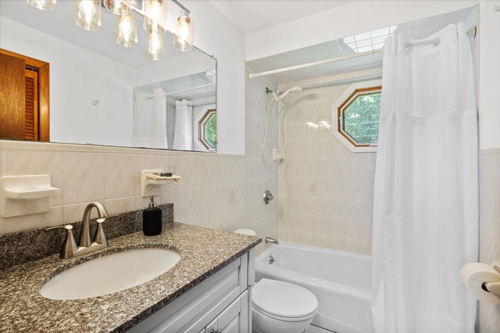 83 Brookside Road Rockland, MA 02370 - Photo 23 of 31 a bathroom with a granite countertop sink toilet and shower