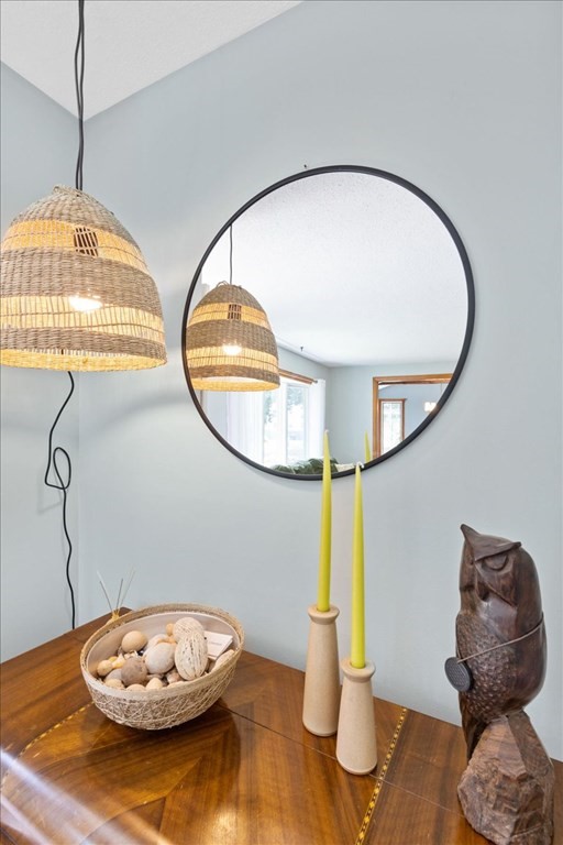 83 Brookside Road Rockland, MA 02370 - Photo 4 of 31 a view of a livingroom with furniture and a mirror
