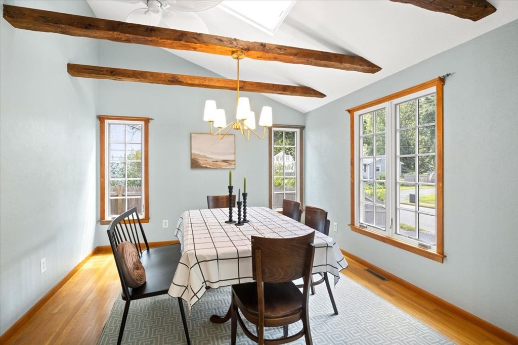 83 Brookside Road Rockland, MA 02370 - Photo 6 of 31 a view of a dining room with furniture and wooden floor