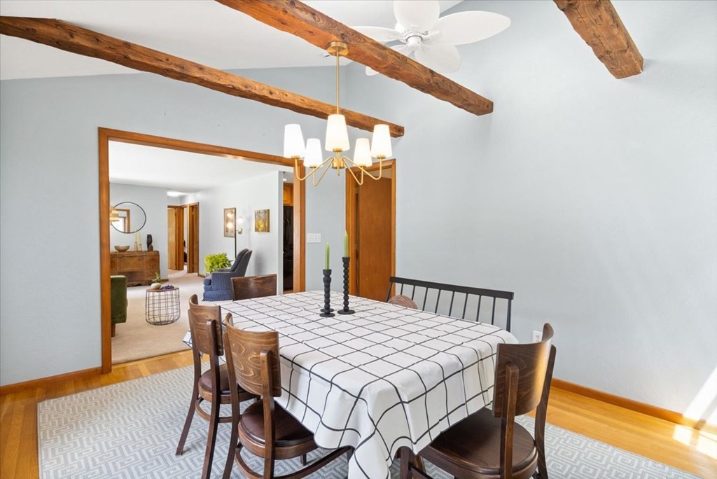 83 Brookside Road Rockland, MA 02370 - Photo 7 of 31 a view of a dining room with furniture and wooden floor