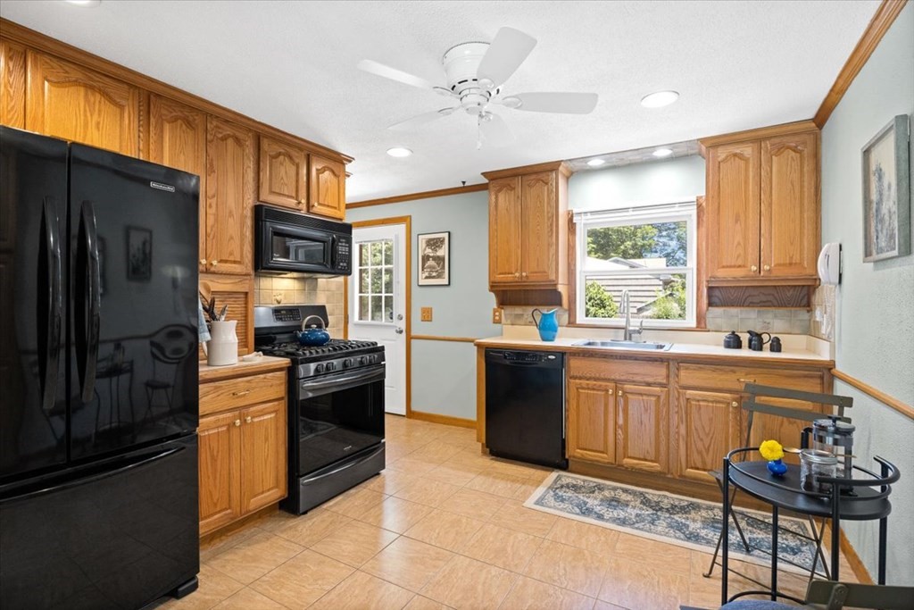 83 Brookside Road Rockland, MA 02370 - Photo 9 of 31 a kitchen with stainless steel appliances granite countertop a stove refrigerator sink and dishwasher