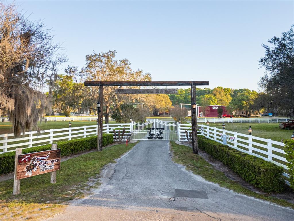 280 Campbell Ranch Run Geneva, FL 32732 - Photo 4 of 18 an outdoor view of a garden with an outdoor seating
