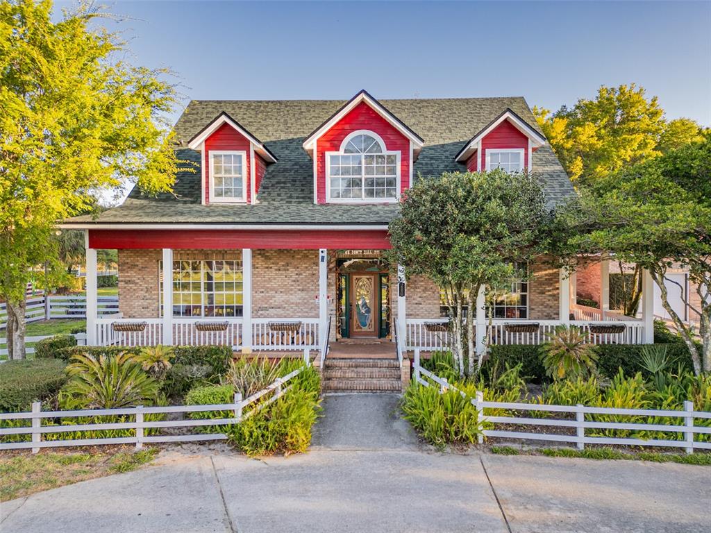 280 Campbell Ranch Run Geneva, FL 32732 - Photo 5 of 18 a front view of a house with a yard