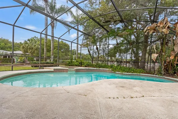 a blue and white house with a outdoor space