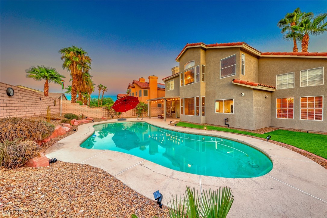 8240 Campana Drive Las Vegas, NV 89147 - Photo 1 of 39 View of pool featuring a patio, a fenced backyard,