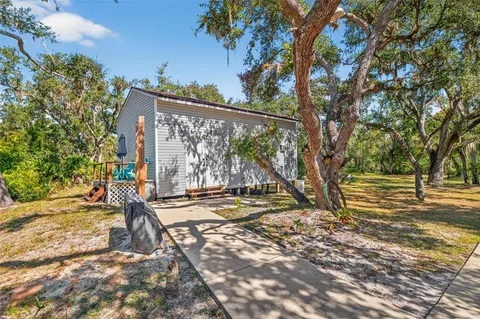 a kitchen with stainless steel appliances granite countertop a stove and a refrigerator