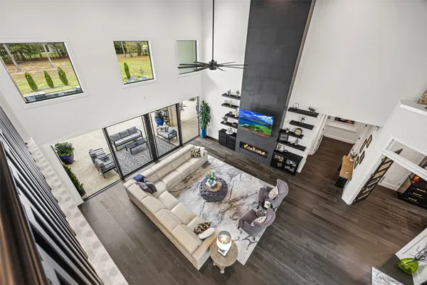 a view of an entryway with wooden floor