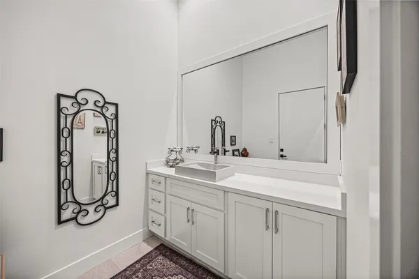 a view of swimming pool with seating area and garden