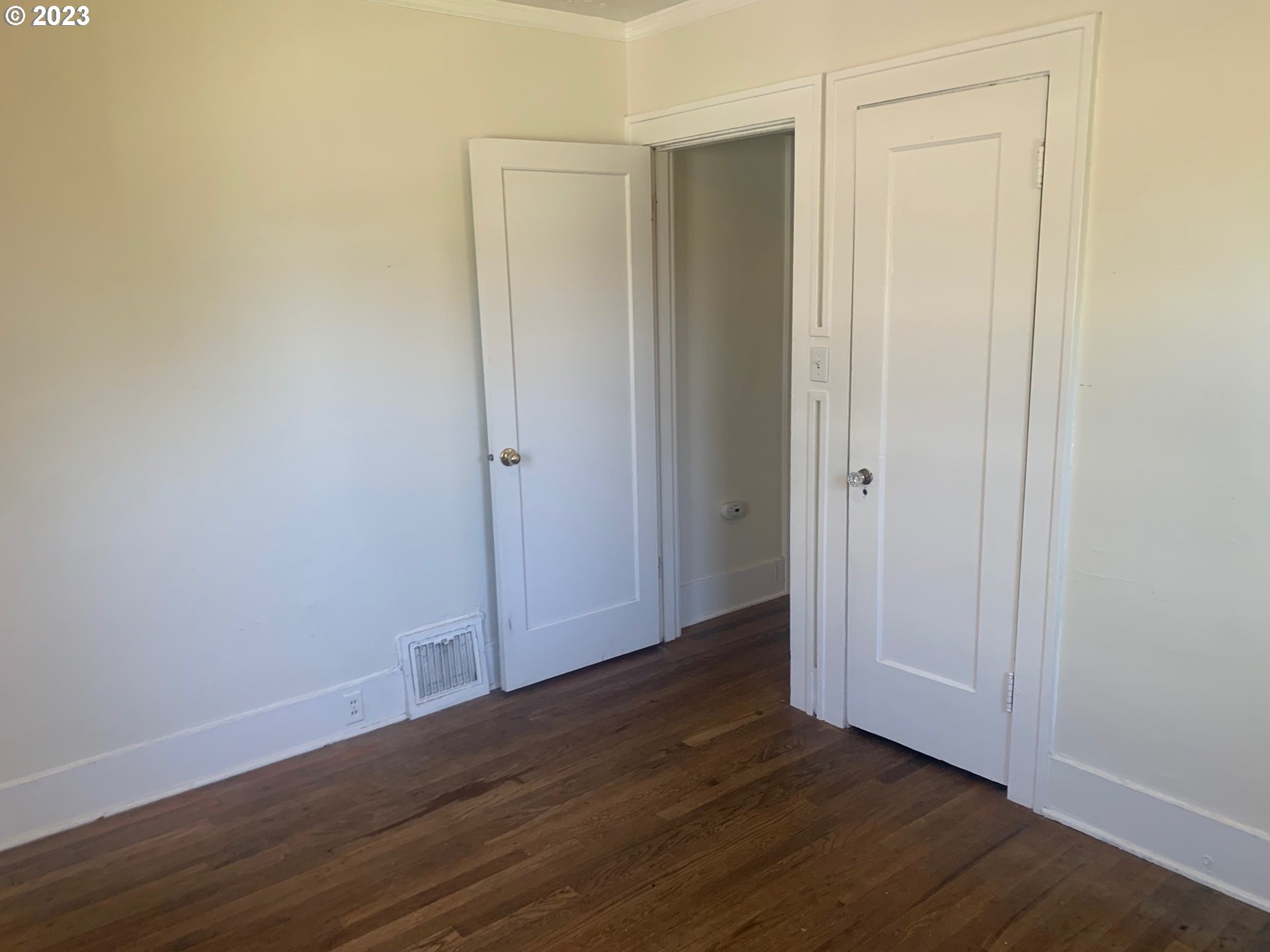 4005 Northeast 70th Avenue Portland, OR 97213 - Photo 16 of 27 a view of an empty room with wooden floor