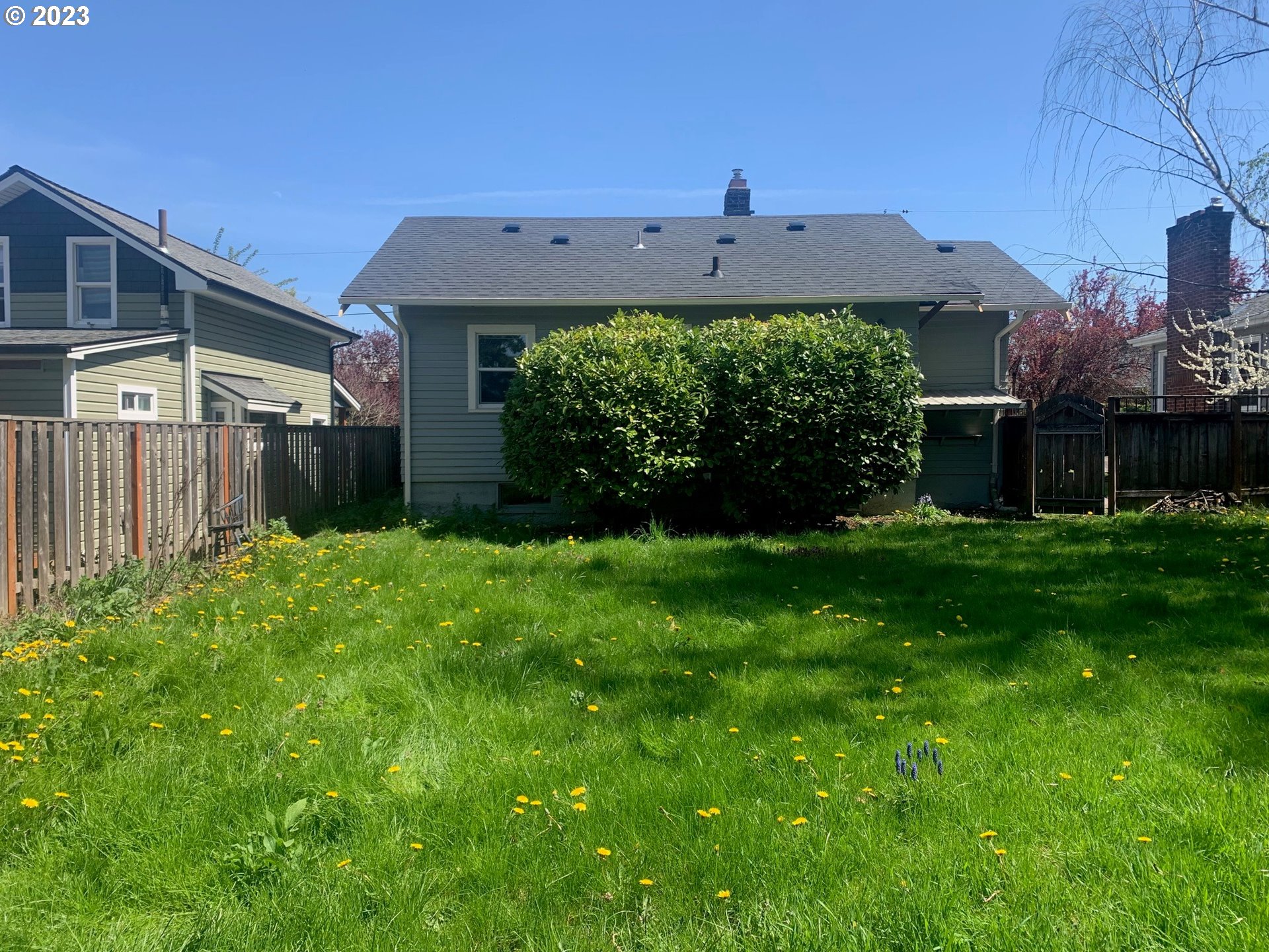 4005 Northeast 70th Avenue Portland, OR 97213 - Photo 2 of 27 a view of a house with a garden