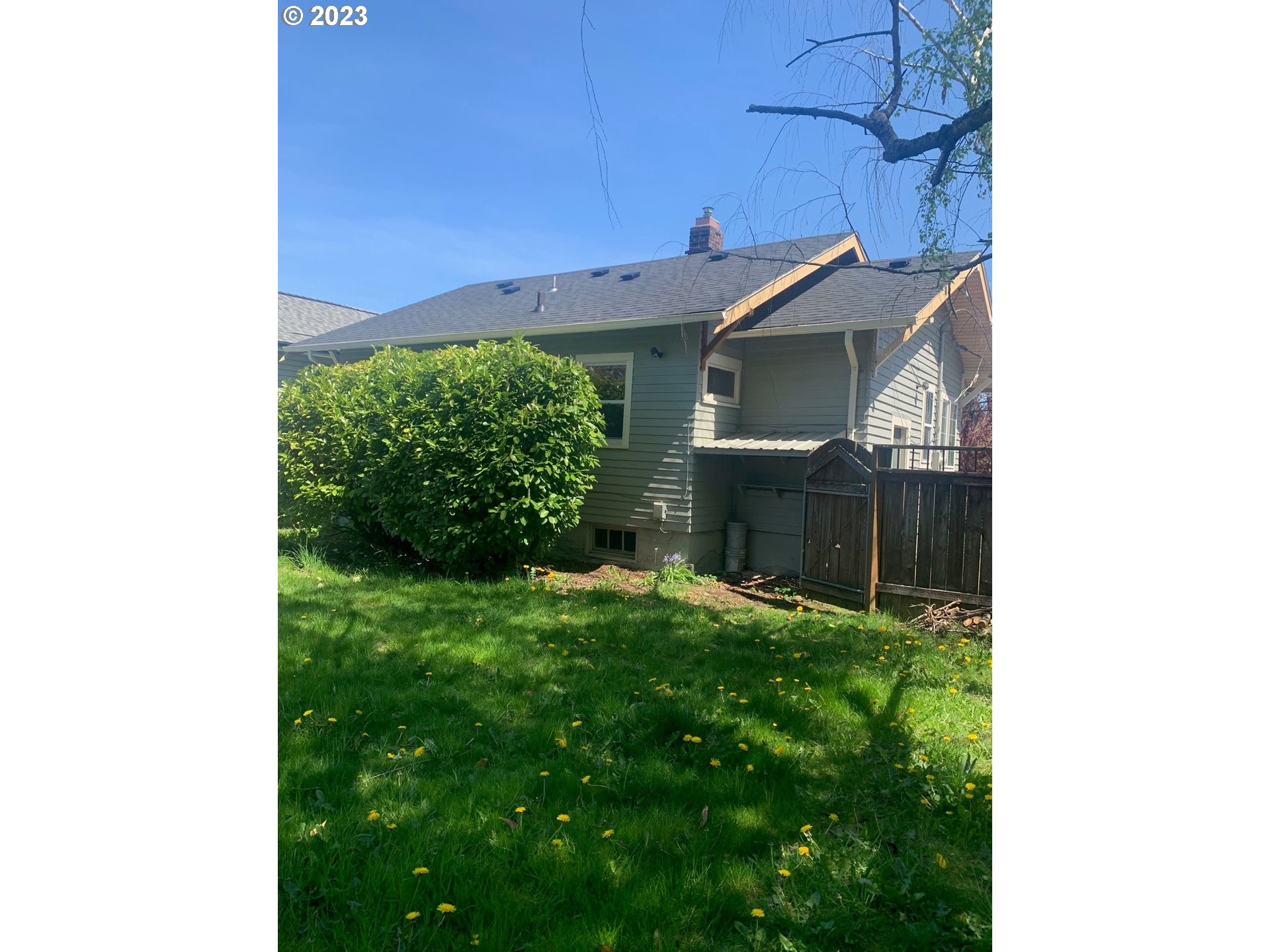 4005 Northeast 70th Avenue Portland, OR 97213 - Photo 26 of 27 a view of a house with a yard