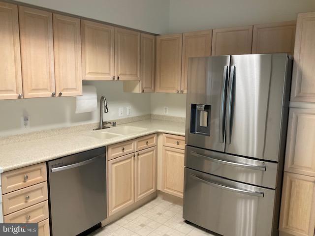 19355 Cypress Ridge Terrace, Unit 1122 Leesburg, VA 20176 - Photo 13 of 71 Modern kitchen with sleek finishes.