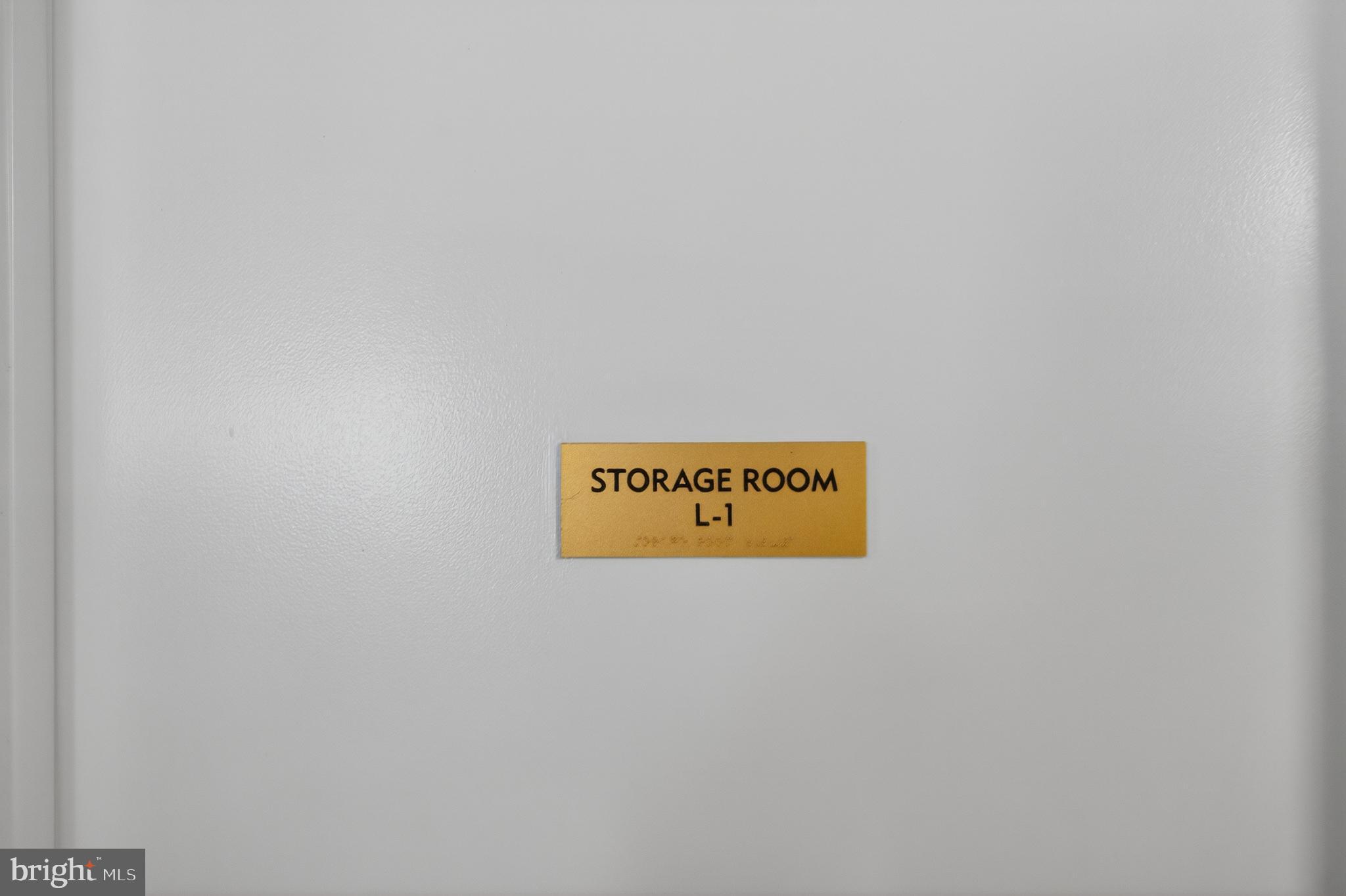 19355 Cypress Ridge Terrace, Unit 1122 Leesburg, VA 20176 - Photo 40 of 71 a wall with a sign on it