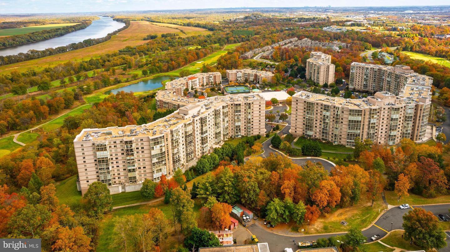 19355 Cypress Ridge Terrace, Unit 1122 Leesburg, VA 20176 - Photo 6 of 25 an aerial view of residential houses with outdoor space