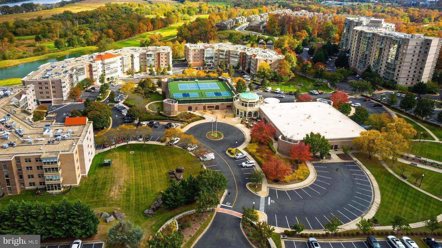 19355 Cypress Ridge Terrace, Unit 1122 Leesburg, VA 20176 - Photo 69 of 71 an aerial view of residential houses with outdoor space