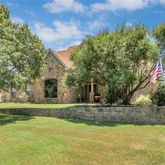 a view of a swimming pool and a yard