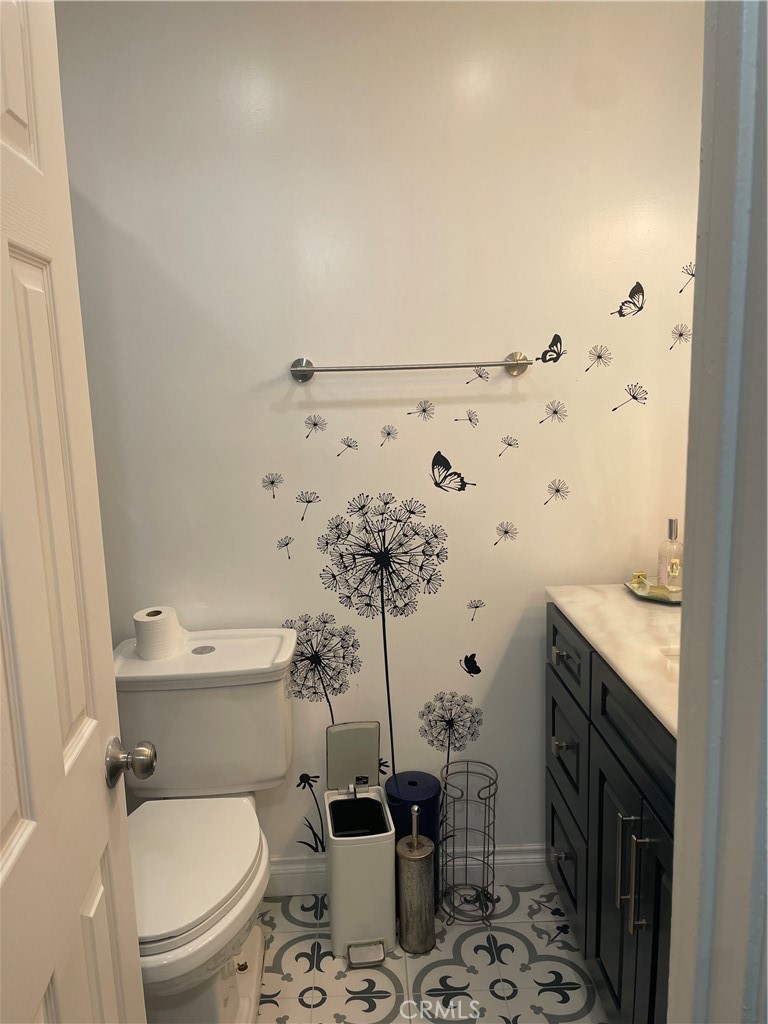 1707 Garvey Avenue, Unit 12 Alhambra, CA 91803 - Photo 13 of 22 a bathroom with a granite countertop bathtub sink vanity mirror and toilet