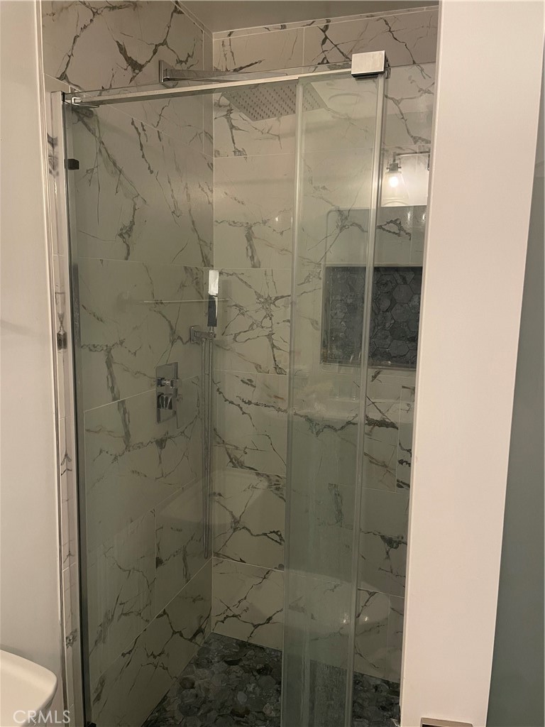 1707 Garvey Avenue, Unit 12 Alhambra, CA 91803 - Photo 19 of 22 a bathroom with a shower