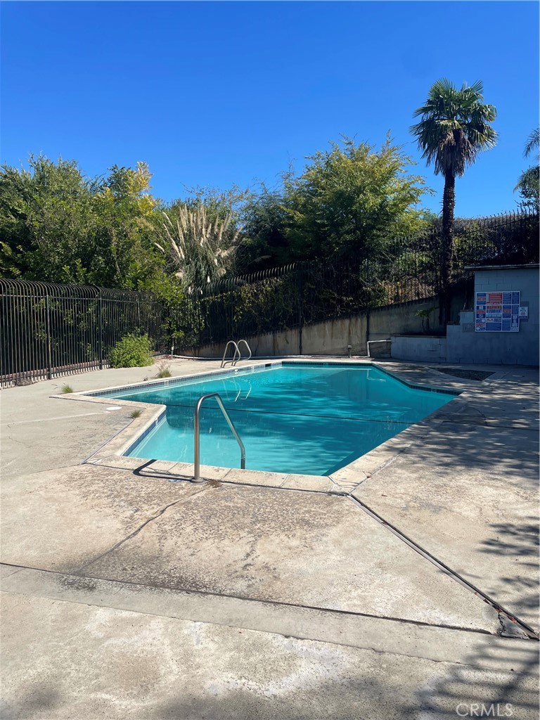 1707 Garvey Avenue, Unit 12 Alhambra, CA 91803 - Photo 20 of 22 a view of a swimming pool with a yard