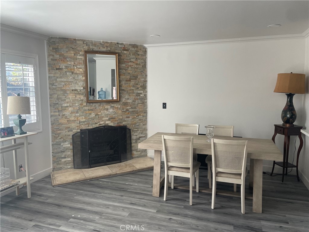 1707 Garvey Avenue, Unit 12 Alhambra, CA 91803 - Photo 5 of 22 a view of a dining room with furniture and wooden floor