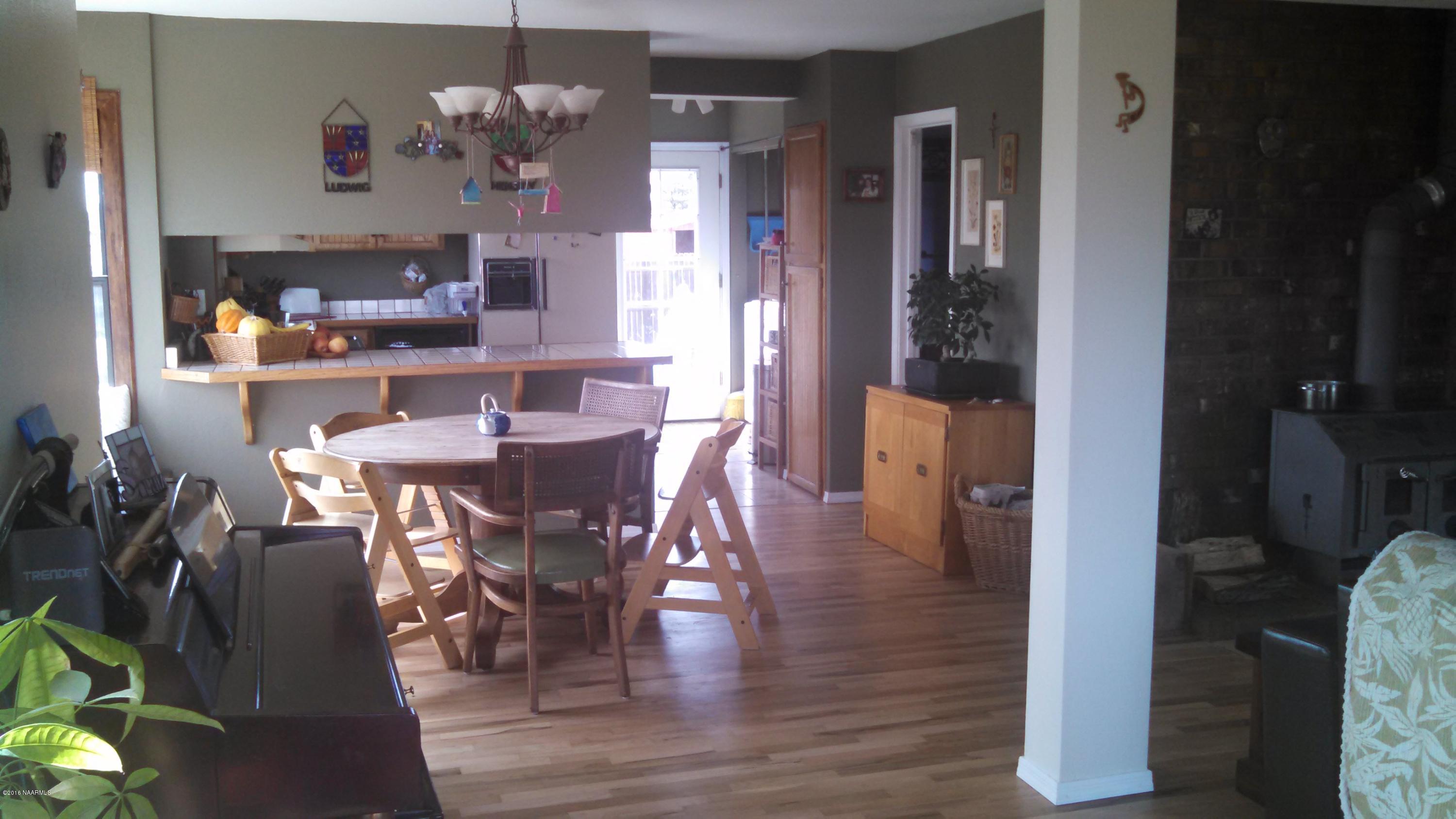 3224 Government Prairie Road Parks, AZ 86018 - Photo 5 of 27 Dining to kitchen