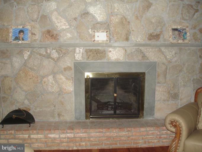 4805 Rollingtop Road Ellicott City, MD 21043 - Photo 15 of 30 Stone wall