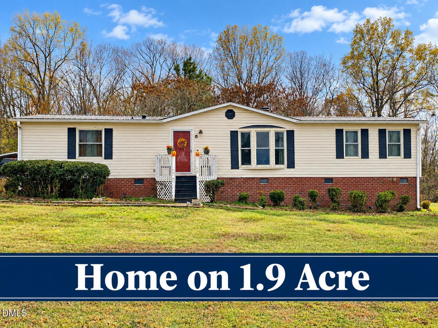 423 West Raleigh Street Bennett, NC 27208 - Photo 1 of 26 Front