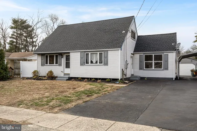 a house with yard in front of it
