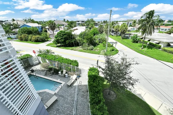 a view of a garden with houses