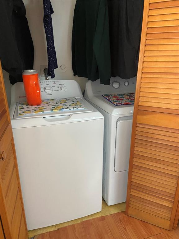 9641 Riverside Drive, Unit F1 Coral Springs, FL 33071 - Photo 18 of 18 a utility room with dryer and washer
