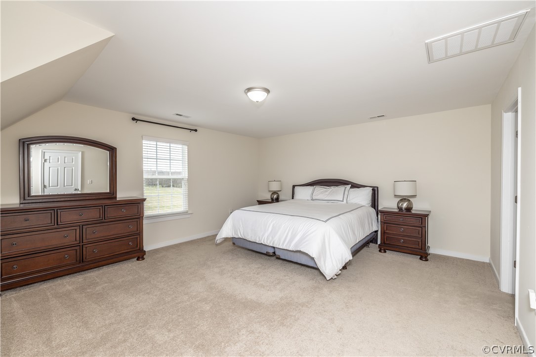 42 Waltons Store Road Louisa, VA 23093 - Photo 33 of 46 a bedroom with a bed and window