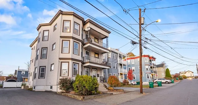 a view of a street with cars