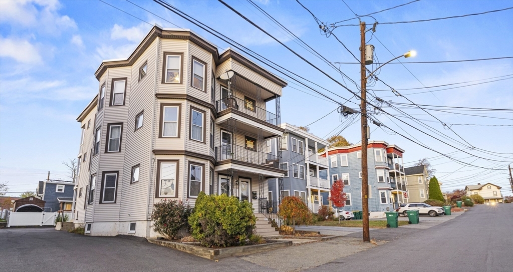 a view of a street with cars