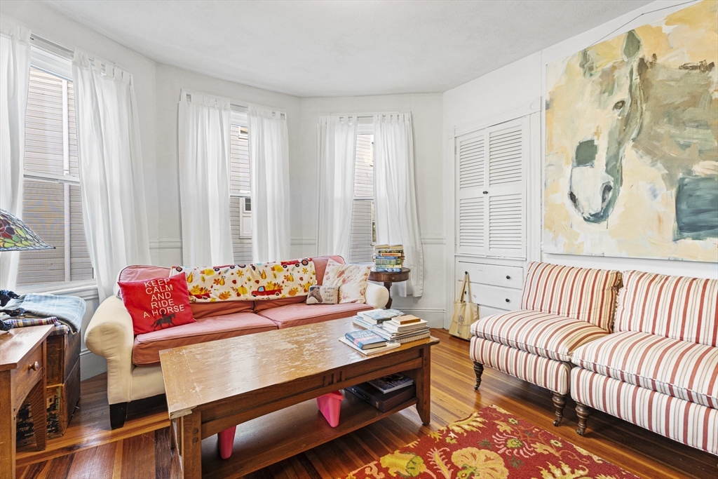 15 Sturgis Street Woburn, MA 01801 - Photo 22 of 38 a living room with furniture and large window