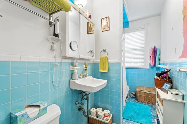 a bed room with a bed and a couch