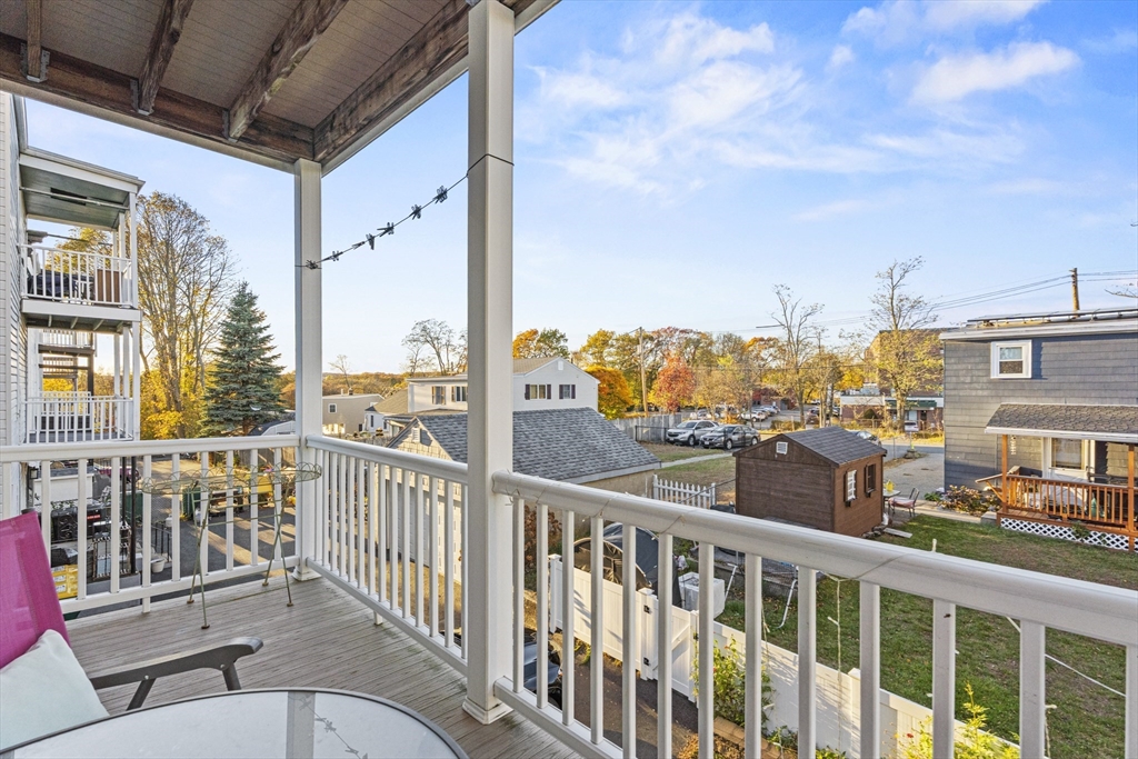 15 Sturgis Street Woburn, MA 01801 - Photo 28 of 38 a view of a balcony with city view