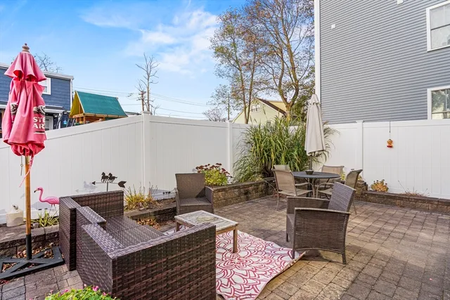 a view of a building with sitting area