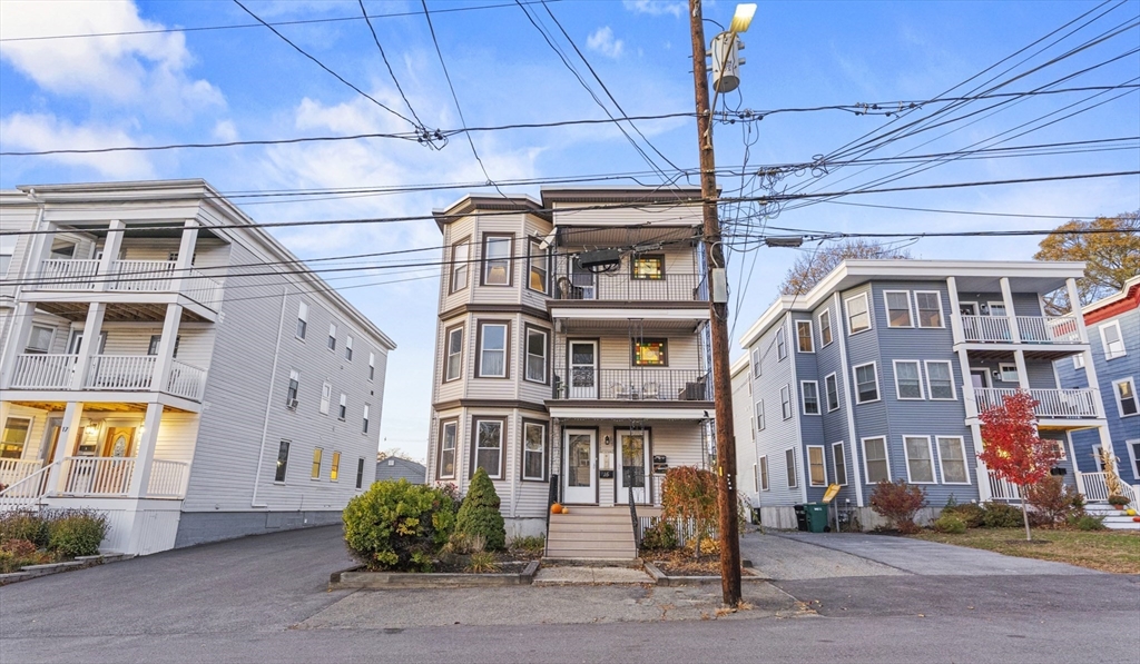 15 Sturgis Street Woburn, MA 01801 - Photo 38 of 38 a front view of a building with street