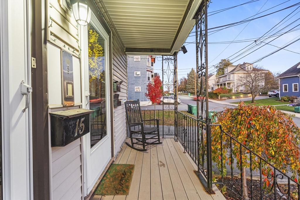 15 Sturgis Street Woburn, MA 01801 - Photo 5 of 38 a view of a balcony with door